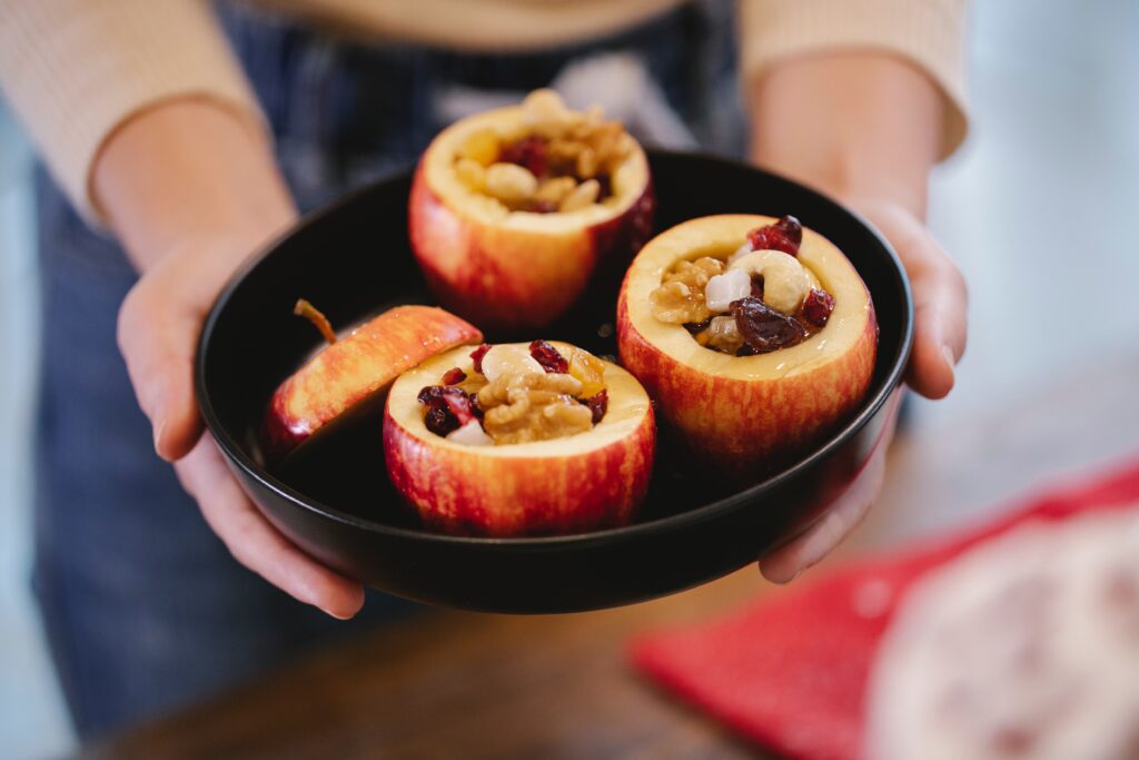 Tasty Apples With Assorted Filling In Baking Pan